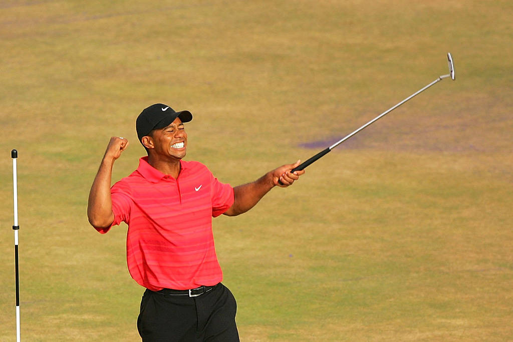 Tiger Woods celebrates winning The Open at Royal Liverpool